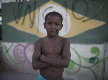Rio's poor watch Olympic opening from rooftops of slum