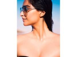 Sonam Kapoor soars temperature in black bikini! Sonam Kapoor soars temperature in black bikini!