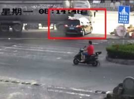 Watch: Car smashed by rolled over tanker, passengers miraculously escape Watch: Car smashed by rolled over tanker, passengers miraculously escape