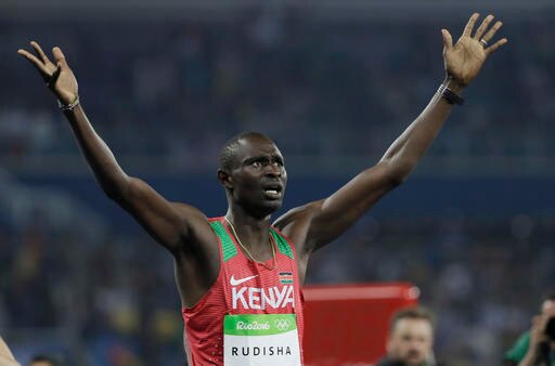 Kenya's David Lekuta Rudisha celebrates winning the men's 800-meter final during the athletics competitions of the 2016 Summer Olympics at the Olympic stadium in Rio de Janeiro, Brazil, Monday, Aug. 15, 2016. (AP Photo/David J. Phillip)