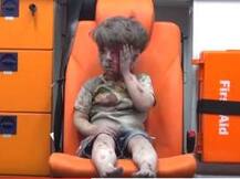 Haunting image of Syrian boy rescued from Aleppo rubble