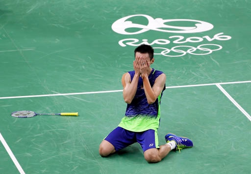 Malaysia's Lee Chong Wei celebrates after defeating China's Lin Dan in their men's badminton singles semifinal match at the 2016 Summer Olympics in Rio de Janeiro, Brazil, Friday, Aug. 19, 2016. (AP Photo/Mark Humphrey)