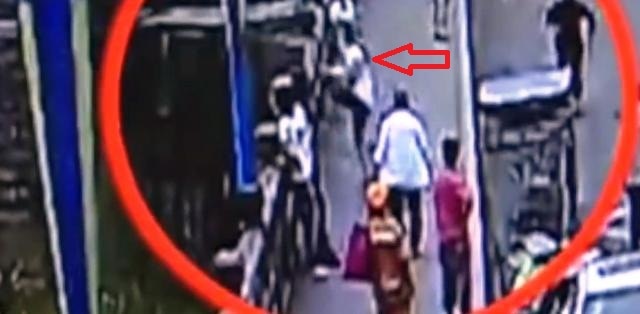 CCTV video: Woman jumps off bridge to commit suicide in China CCTV video: Woman jumps off bridge to commit suicide in China