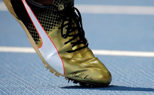Usain Bolt's signed running shoe auctioned sold for Rs 12 lakh!