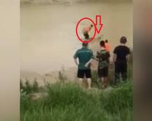 Watch: ‘Dead’ body leaps from river, alarms rescue worker