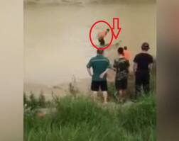 Watch: ‘Dead’ body leaps from river, alarms rescue worker