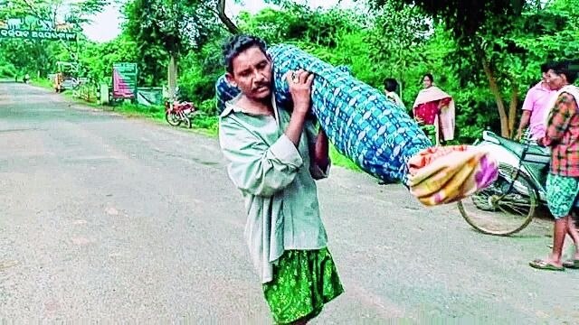 Odisha Denied A Mortuary Van Husband Shoulders Wifes Body For 16km