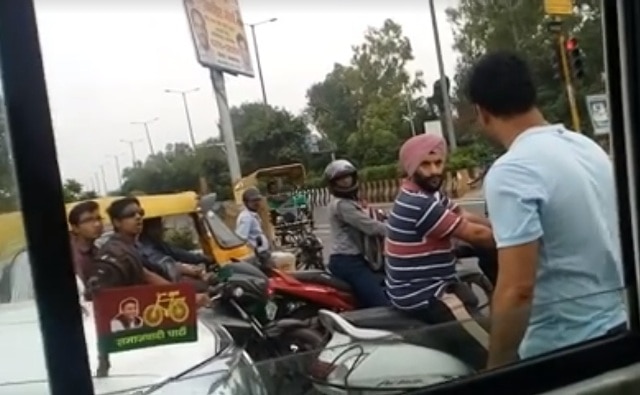 Noida: 'VIP' bullies common man at traffic signal, threatens man filming the incident Noida: 'VIP' bullies common man at traffic signal, threatens man filming the incident