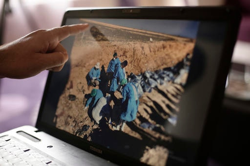 Islamic State buried thousands in 72 mass graves