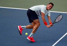 US Open: Cramping Milos Raonic loses to qualifier Ryan Harrison