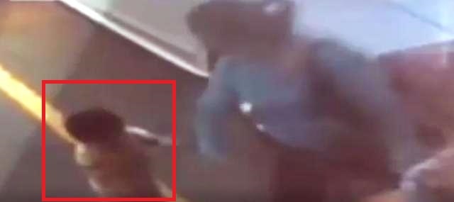 Gruesome video: Mother abuses kid in public, kicks him in the chest! Gruesome video: Mother abuses kid in public, kicks him in the chest!