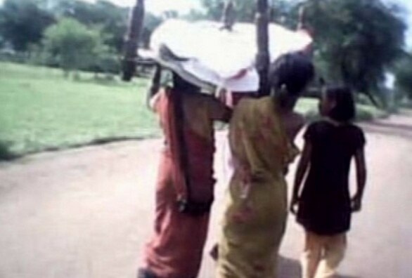 Daughters dismantle own roof top to gather wood for mother's funeral Daughters dismantle own roof top to gather wood for mother's funeral