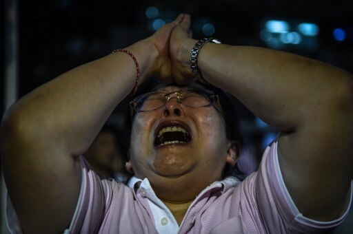 PICTURES: Thailand mourns death of King Bhumibol Adulyadej, tourists alerted PICTURES: Thailand mourns death of King Bhumibol Adulyadej, tourists alerted