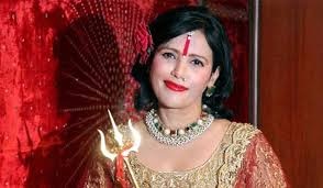 Radhe Maa dances with police officers, two suspended  Radhe Maa dances with police officers, two suspended