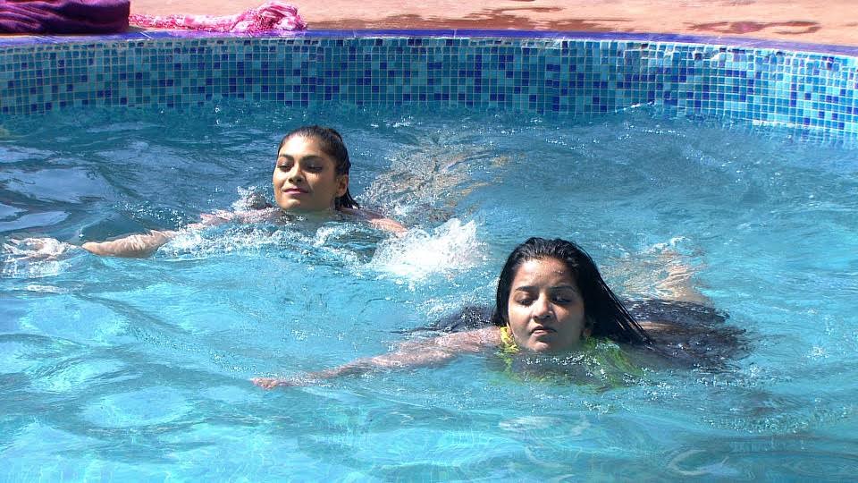 BIGG BOSS DAY 18: Bikini clad Lopa & Mona Set The Temperature Soaring In Pool, Manu & Swamiji Awestruck!