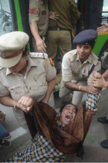 Mother of missing JNU student dragged away by police during protest