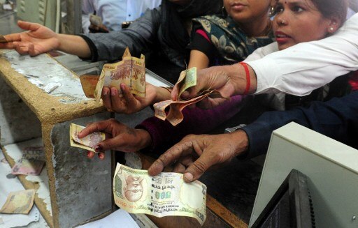 Cash market in chaos after large currency notes become illegal Cash market in chaos after large currency notes become illegal