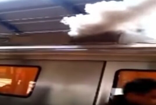 WATCH: Last coach of Delhi Metro catches fire at Patel Nagar WATCH: Last coach of Delhi Metro catches fire at Patel Nagar