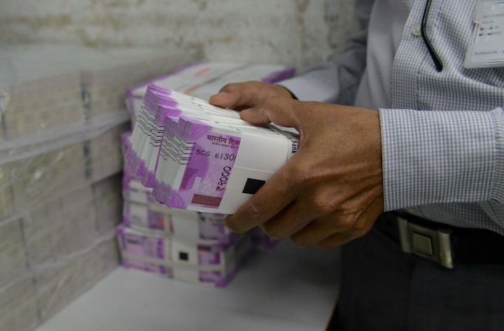 CBI recovers Rs 70 lakh in new currency near Hyderabad in raids on postal official's kin CBI recovers Rs 70 lakh in new currency near Hyderabad in raids on postal official's kin
