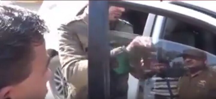 VIRAL VIDEO: Kashmir University VC's heated argument with a cop over tinted glass VIRAL VIDEO: Kashmir University VC's heated argument with a cop over tinted glass