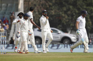 India's captain Virat Kohli, second right, celebrates the dismissal of England's Jos Buttler, first right, during their second day of the fifth cricket test match (AP PHOTO)
