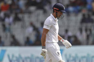 England's captain Alastair Cook leaves ground after he was dismissed by India's Ravindra Jadeja during their first day of the fifth cricket test match in Chennai, India, Friday, Dec. 16, 2016. (AP Photo/Tsering Topgyal)