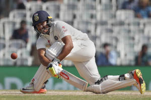 India's Karun Nair plays a shot during the fourth day of the fifth cricket test match against England in Chennai, (AP Photo/Tsering Topgyal)