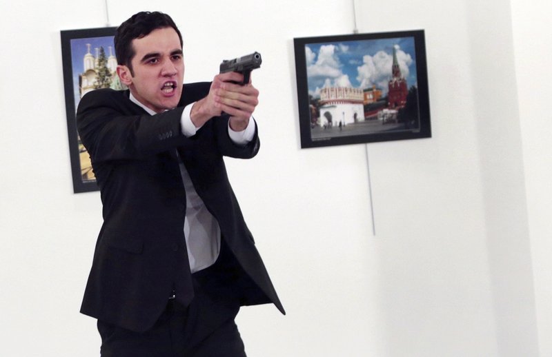 AP photographer recounts chaos that unfolded as he captures assassination of Russian ambassador