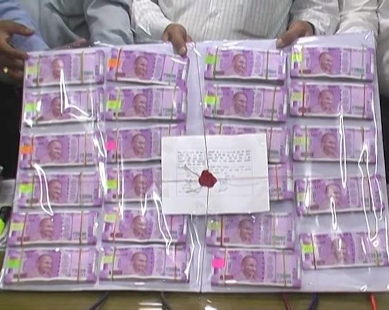 Rs 58 lakh cash and foreign currency including US dollars seized from 'hing' trader in Punjab