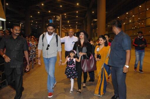 Well, Aaradhya looked like a doll in a frock full of different shades of stars and mommy Aish wore black jeans with the same colour overcoat and looked gorgeous specially with that black hat while Abhishek sported a grey hoodie with denims. It seems that they spent their vacation nicely. (IMAGE COURTESY: SOLARIS)