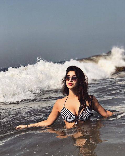 The actress who was body shamed before, she has daringly posted another picture in bikini and undoubtedly it has risen the temperature. In the picture Sonarika wears black and white bikini and while sharing, she writes, “Seas the day #saltyairsandyhair”
