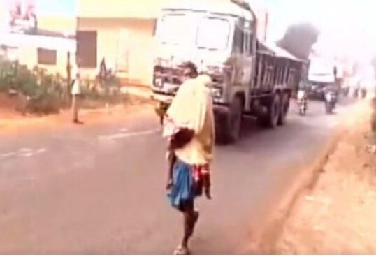 Humanity shamed in Odisha: Man denied hearse van for dead daughter, carries her on shoulder  Humanity shamed in Odisha: Man denied hearse van for dead daughter, carries her on shoulder