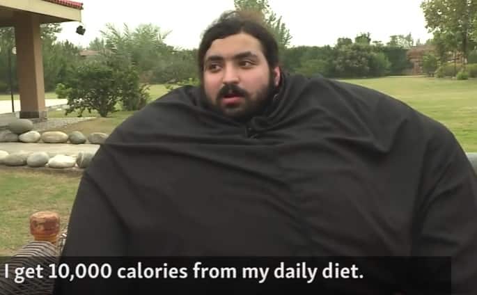 Hayat says he faces no health issues because of his phenomenal weight. 'I don't have any medical conditions nor do I feel uncomfortable with my weight. But I have to keep at it if I want to become a world champion strong man,' he said. PIC/Radio Free Europe/Radio Liberty (YouTube)