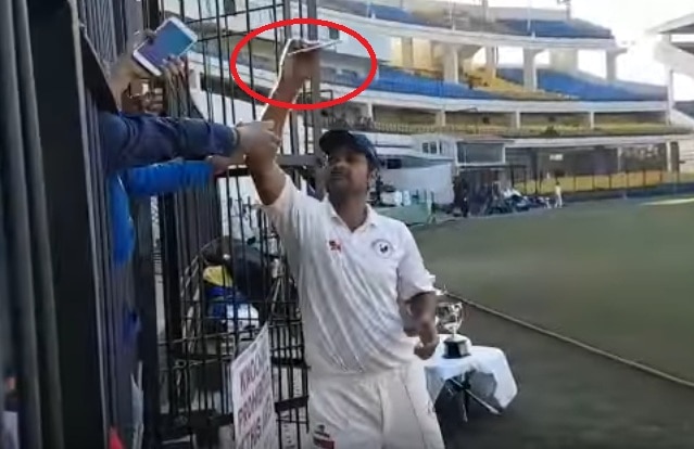 WATCH VIDEO: Pacer RP Singh throws fan's mobile during Ranji Trophy final WATCH VIDEO: Pacer RP Singh throws fan's mobile during Ranji Trophy final