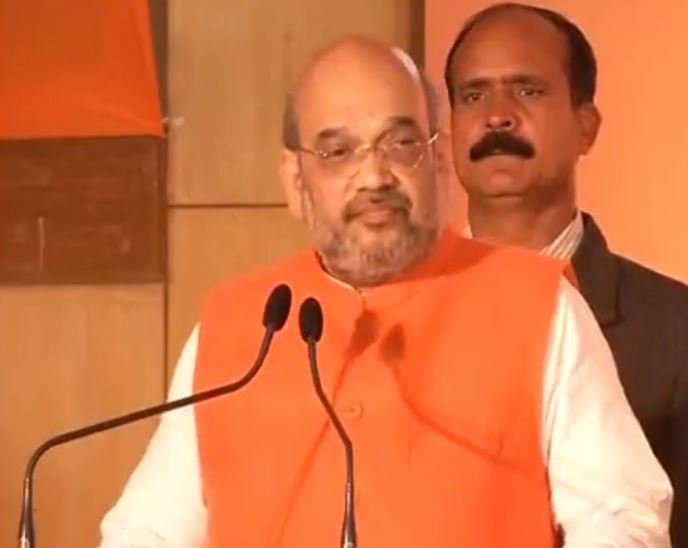 BJP Chief Amit Shah releases manifesto for 2017 UP Assembly polls, says will build 'Ram Mandir' as per constitutional means BJP Chief Amit Shah releases manifesto for 2017 UP Assembly polls, says will build 'Ram Mandir' as per constitutional means