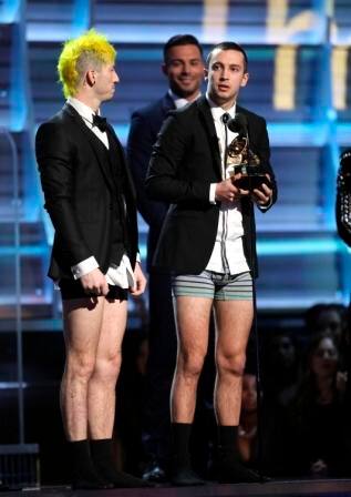 Tyler Joseph and Josh Dun of twenty-one pilots go pantless to receive the award and report says it was pre planned; after all, there is no dress code for the Grammys. (Picture credit: AP Exchange)