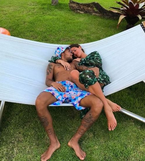 Barcelona forward Neymar simply wrote, 'Happy Valentine's Day', on a picture of the pair relaxing on a beach
