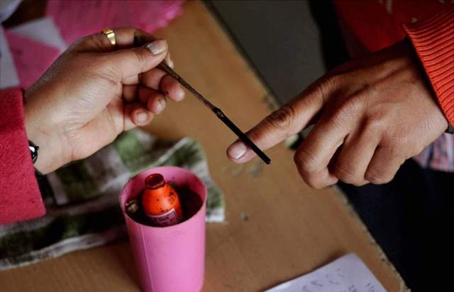 Himachal :Teacher on poll duty takes selfie with postal ballot, HP Polls: Teacher on poll duty takes selfie with postal ballot, booked