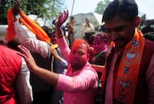 Jubilant BJP workers celebrate Holi outside party office in Lucknow