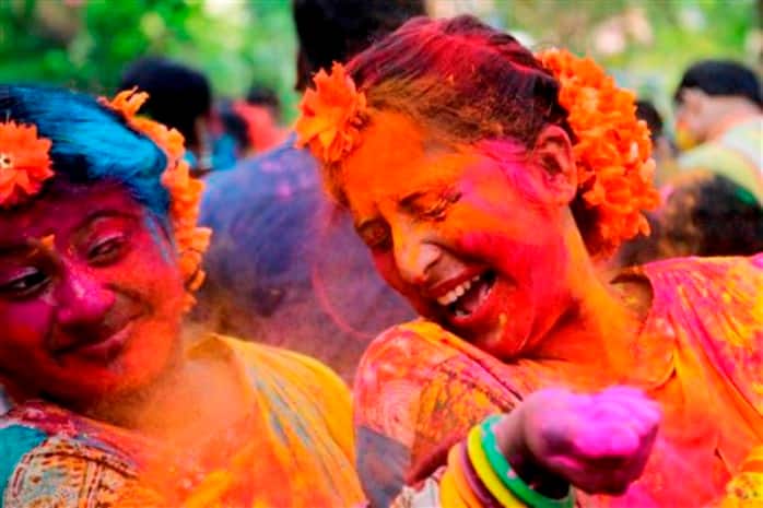 Indian Hindus celebrate the festival of colors or Holi in Kolkata, India, Wednesday, March 23, 2016. The holiday, celebrated mainly in India and Nepal, marks the beginning of spring and the triumph of good over evil. (AP Photo/Bikas Das)