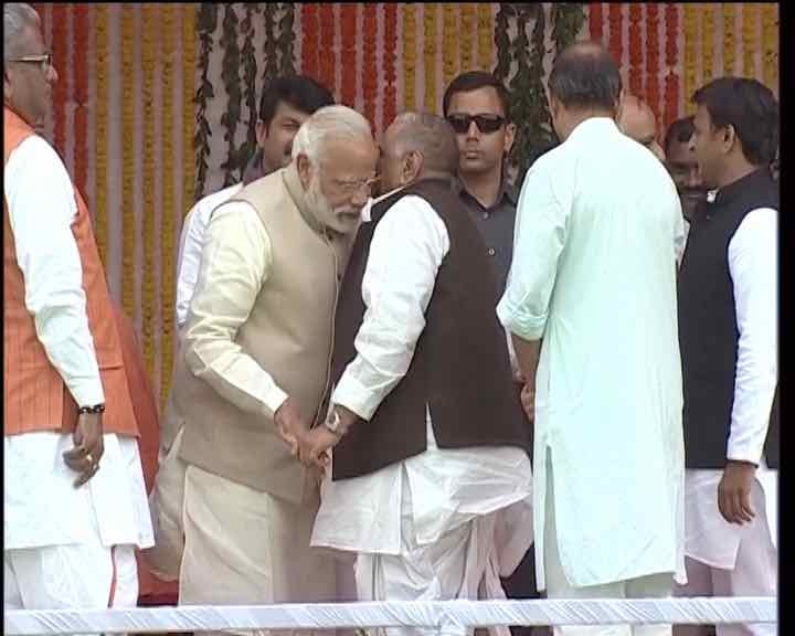Please take care of Akhilesh, teach him: Mulayam whispered into PM Modi's ear Please take care of Akhilesh, teach him: Mulayam whispered into PM Modi's ear