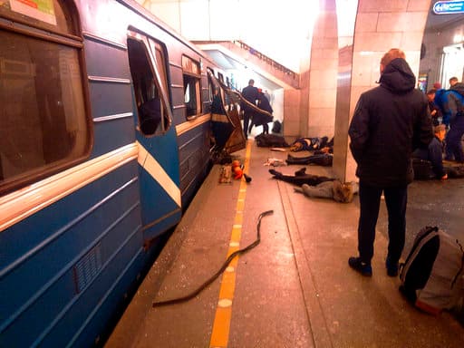 Blast victims lie near a subway train hit by a explosion at the Tekhnologichesky Institut subway station in St.Petersburg, Russia, Monday, April 3, 2017. The subway in the Russian city of St. Petersburg is reporting that several people have been injured in an explosion on a subway train. (AP Photo/DTP&ChP St. Peterburg via AP)