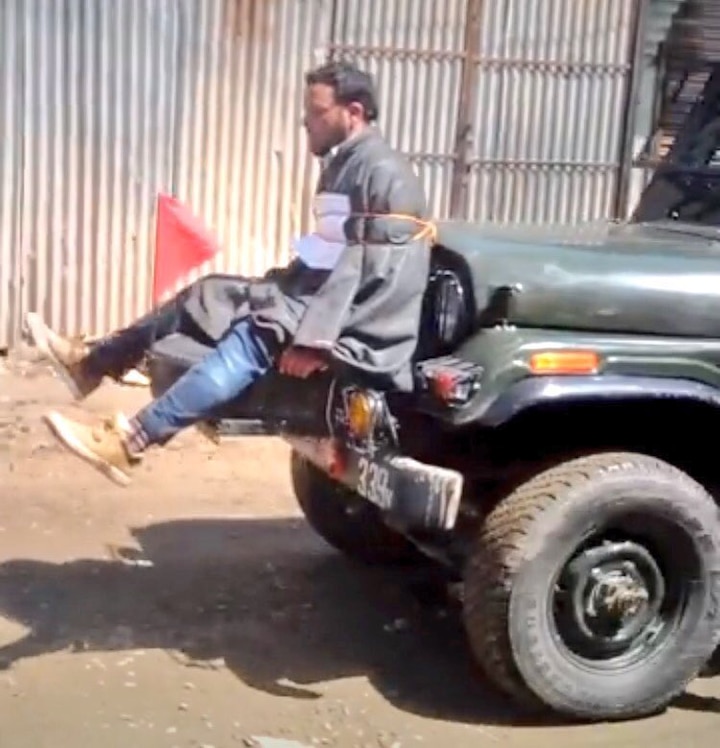 Viral Video: Youth in Kashmir allegedly tied in front of army jeep Viral Video: Youth in Kashmir allegedly tied in front of army jeep