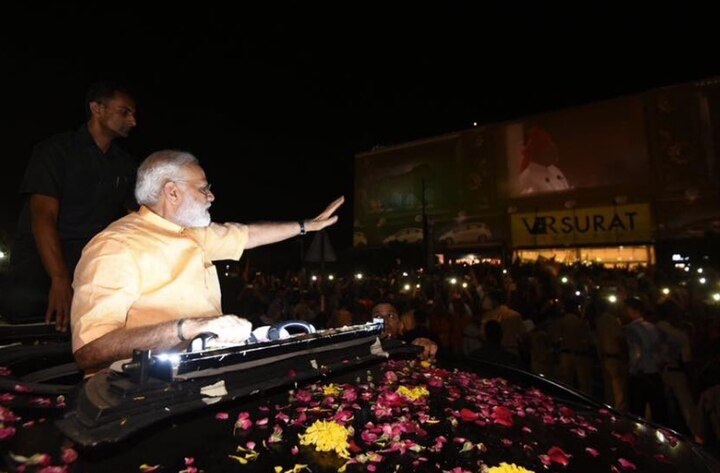 Gujarat: PM Modi sounds poll bugle in home turf with mega roadshow in Surat Gujarat: PM Modi sounds poll bugle in home turf with mega roadshow in Surat