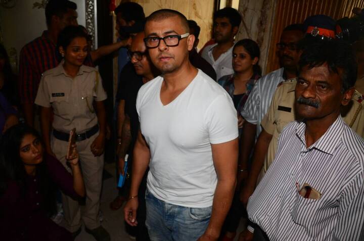 He appeared before the media with clean-shaven pate, wearing spectacles and smiling away happily even as various Muslim groups and organizations protested and contemplated moving the courts against him.