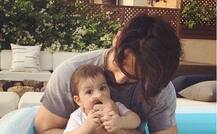 Daddy Shahid enjoys pool time with \'missy\' Misha