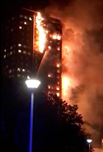 The London Ambulance Service said the 15 were taken to hospitals. Police said earlier they were continuing to evacuate people from the apartment building Wednesday morning. PIC/AP.