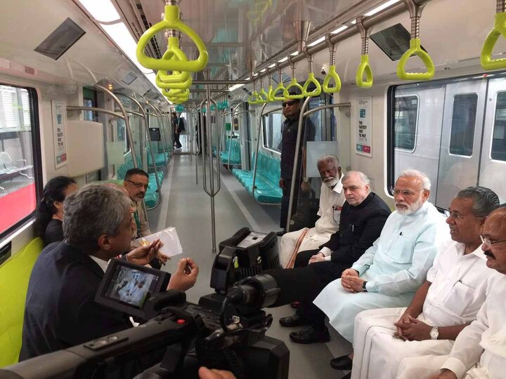 Kerala's first Metro in Kochi flagged off by PM Modi, joined by CM and 'Metro Man' Kerala's first Metro in Kochi flagged off by PM Modi, joined by CM and 'Metro Man'