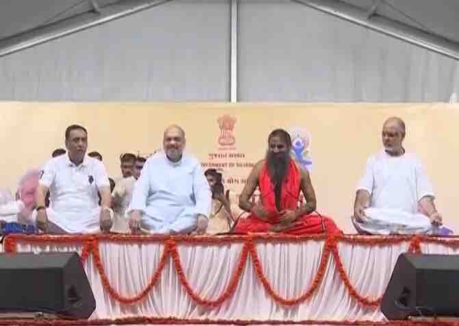 Live Updates: Amit Shah joins Ramdev at GMDC ground Ahmedabad on International Yoga Day Live Updates: Amit Shah joins Ramdev at GMDC ground Ahmedabad on International Yoga Day