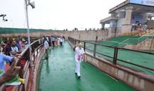 PM Modi performs asanas amid rain, says yoga connecting world with India